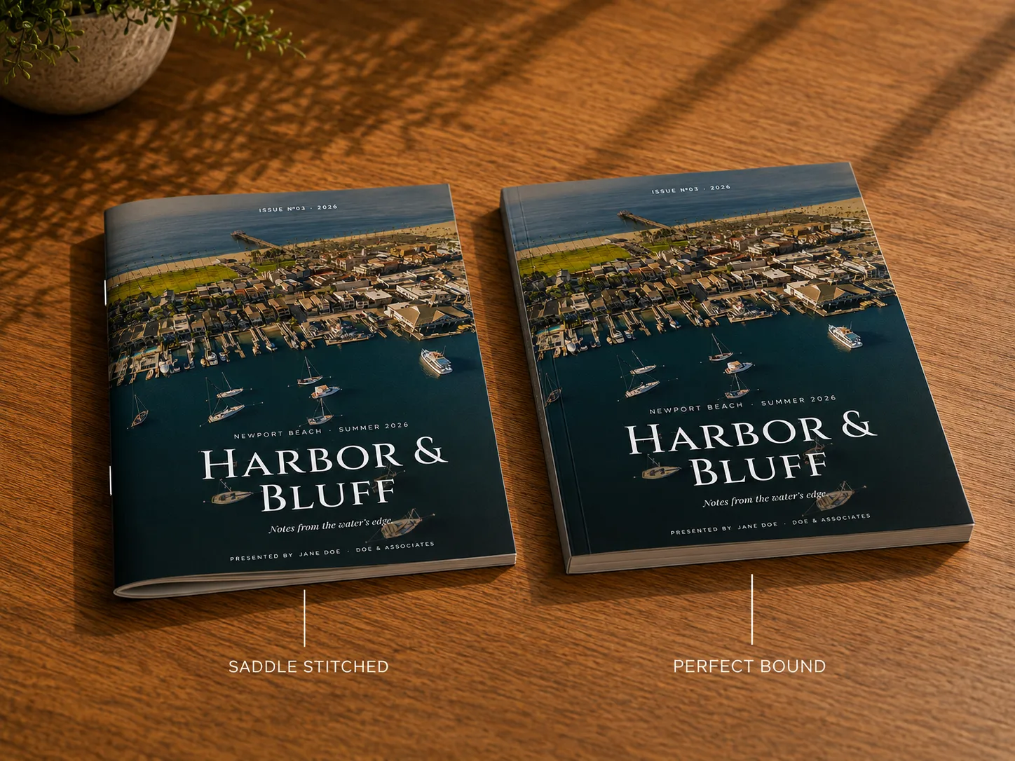 Two identical magazines side by side: the saddle-stitched copy has a creased folded spine, the perfect-bound copy a flat squared one